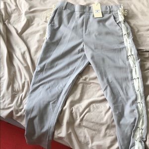 Grey pants with white side